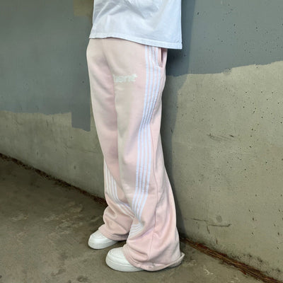 AVSLAPPNADE RETRO TVÄTTADE JOGGERS