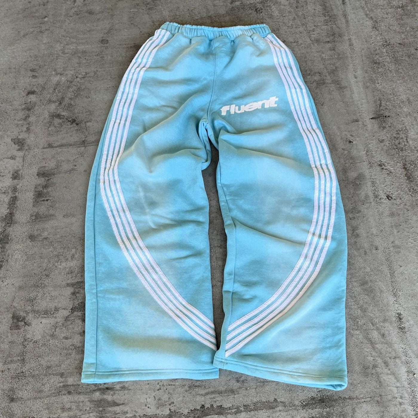 AVSLAPPNADE RETRO TVÄTTADE JOGGERS